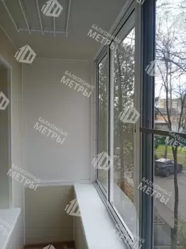 Отделка балкона под ключ с холодным остеклением и выносом остекления Отделка балкона под ключ с холодным остеклением и выносом остекления