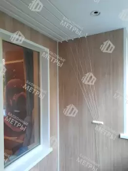 Отделка балкона под ключ ламинатом и натяжным потолком Отделка балкона под ключ ламинатом и натяжным потолком